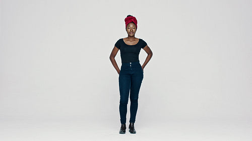  Smiling African woman in a headwrap