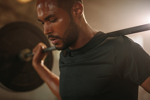 Man working out with heavy weights