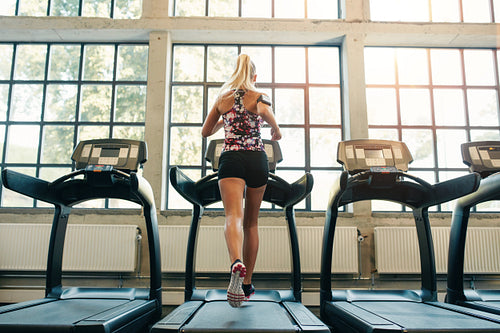Woman jogging on treadmill