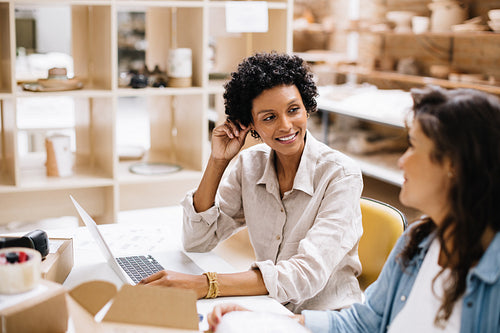 Female entrepreneurs running an online business