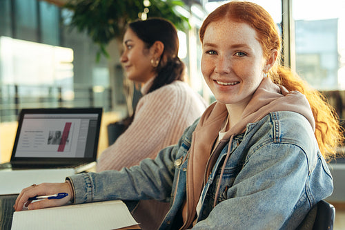 Woman at group study session in college