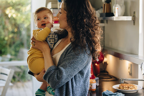 Mom in kitchen with baby