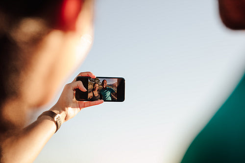 Athletic couple taking a selfie