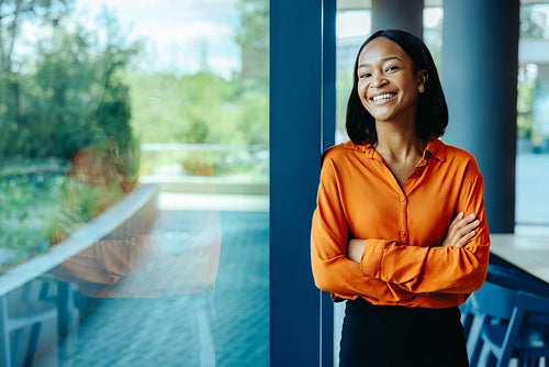 Confident African businesswoman embodying corporate success and professionalism