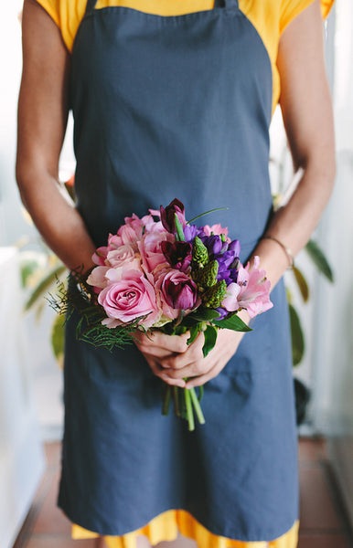Florist with fresh flower bouquet