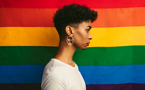 Profile view of gay man with makeup