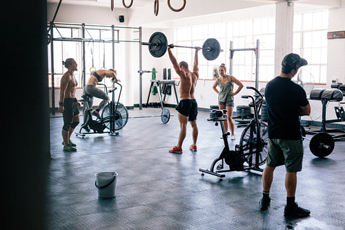 Fitness people doing cross training in gym.