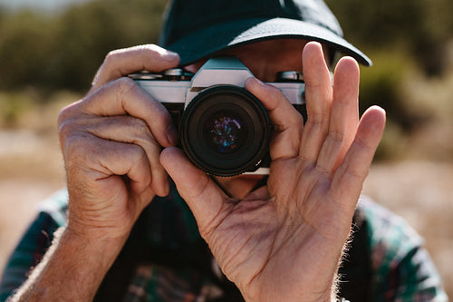 Hiker taking pictures of nature