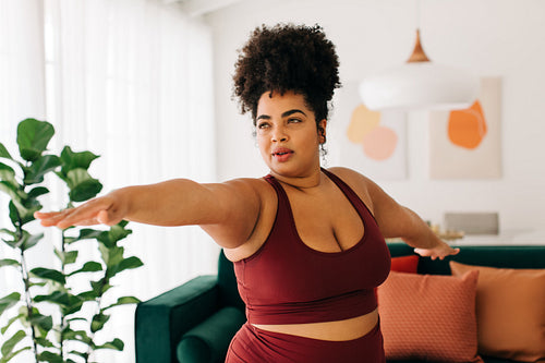 Healthy woman doing workout at home