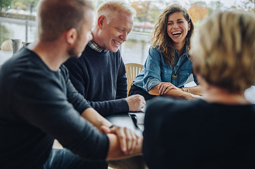 Business team discussing over an agreement in meeting