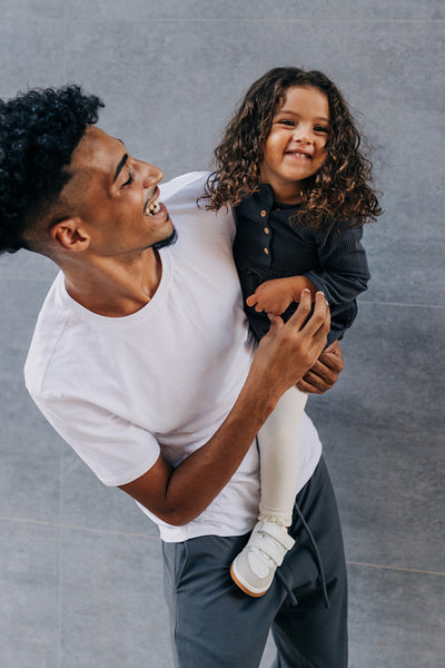Father and daughter laughing and having fun on father's day