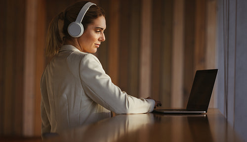 Caucasian business woman joining an online meeting on a laptop