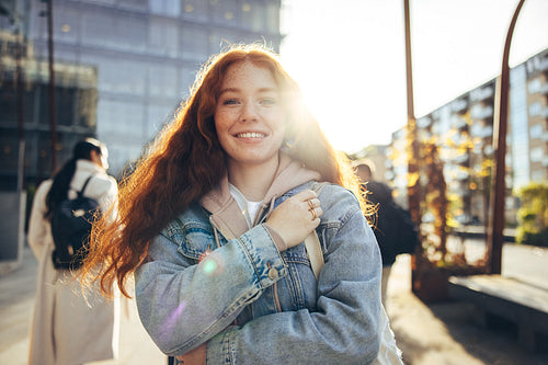 Beautiful girl standing in college campus
