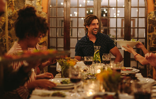Group of friends enjoying dinner party