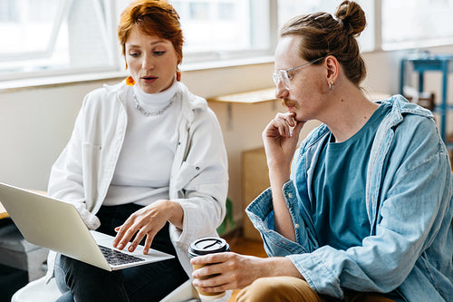 Colleagues collaborating in a modern co-working space