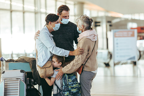 Family reunion at airport after pandemic