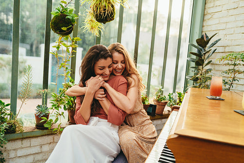 Best friends bonding by the piano