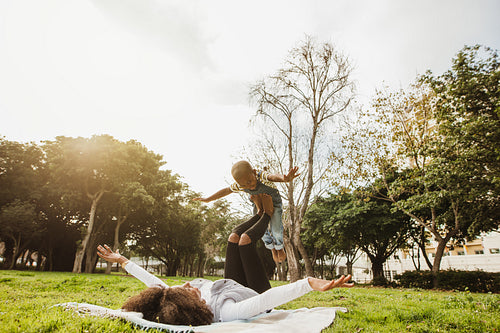 Mother and son playing at park