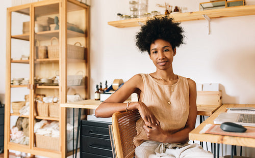 Jewelry designer sitting at her office