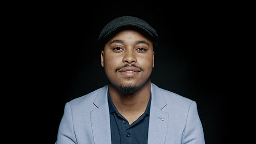 African businessman in a cap