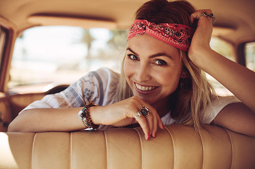 Smiling woman on a road trip