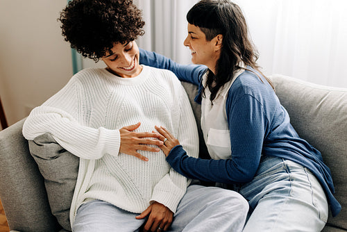 Two lesbian women expecting a baby together