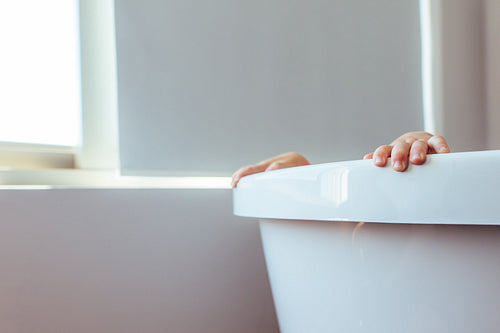 Playing hide and seek in the bath tub