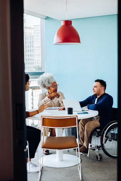 Business meeting with diverse team at round table