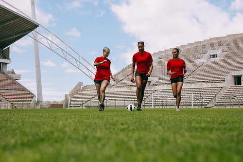 Footballers playing on the field