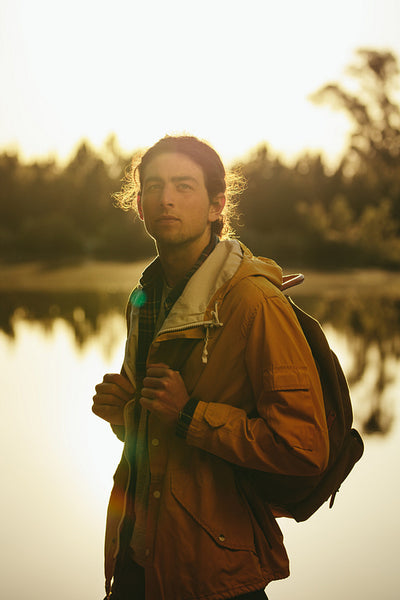 Portrait of a traveler standing outdoors