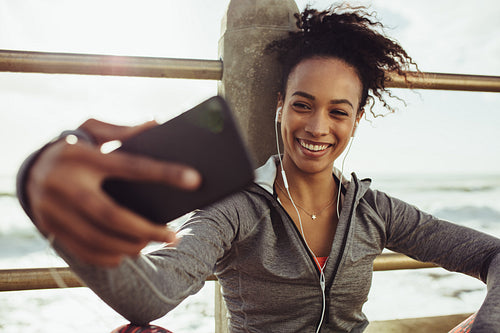 Runner taking selfie