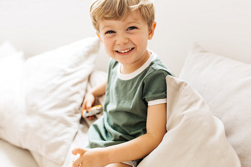 Adorable boy smiling at camera