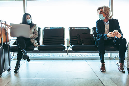 Social distancing at airport waiting area