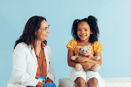 Doctor and girl patient girl in clinic