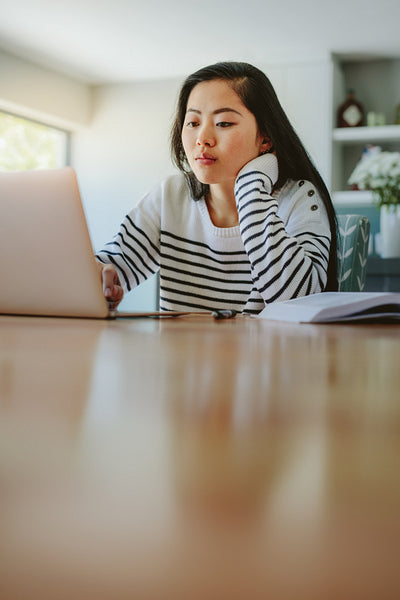 Girl studying at home.