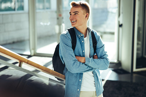 Happy university student in campus