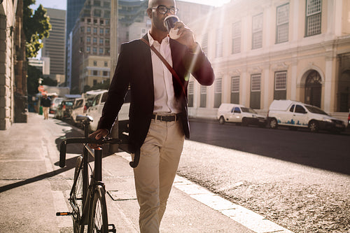 Businessman going to work by bicycle