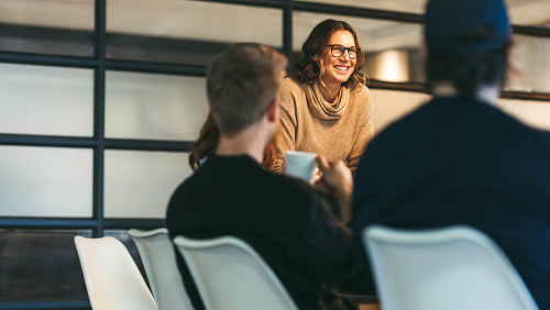 Creative teamwork in a tech company's boardroom