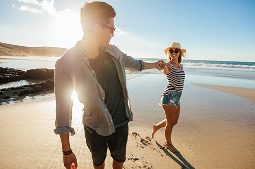 Loving young couple enjoying on beach vacation