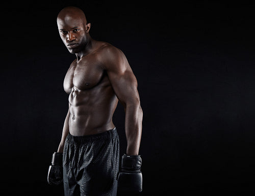Portrait of muscular male boxer