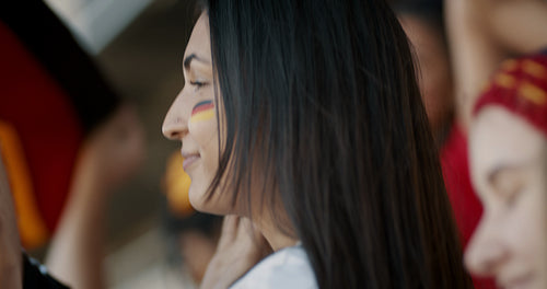 German soccer fan cheering during a live game