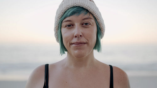 Portrait of cheerful woman on the beach