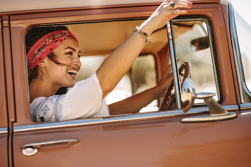 Woman enjoying driving car