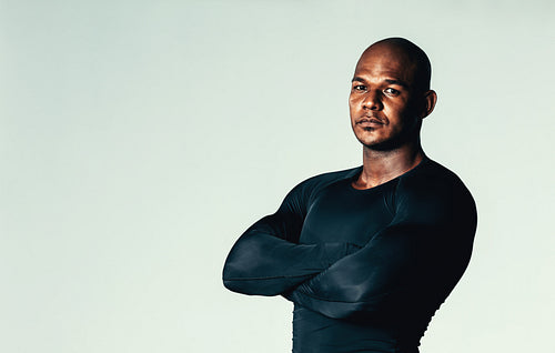 African model wearing gym training compression t-shirt 