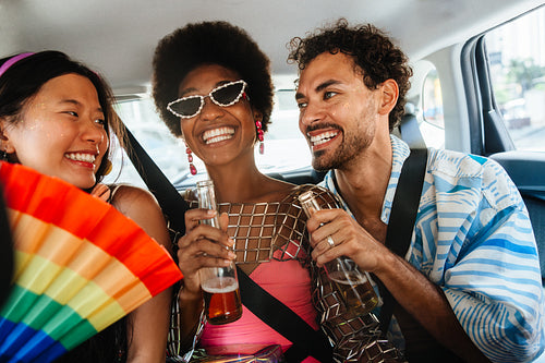 Friends on their way to Brazilian carnival in car