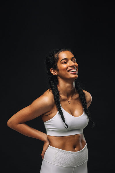 Fit woman relaxing after workout