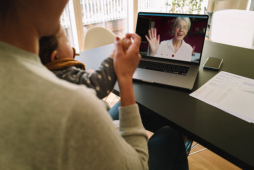 Woman having a video call with her mother
