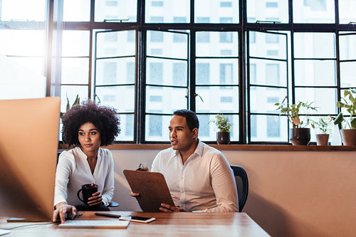 Couple working at startup office