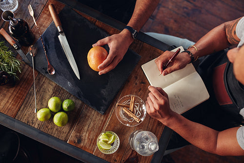 Barmen experimenting with creating cocktail drink