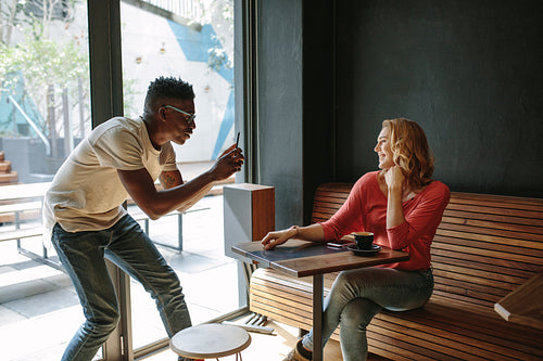 Friends having fun at a coffee shop